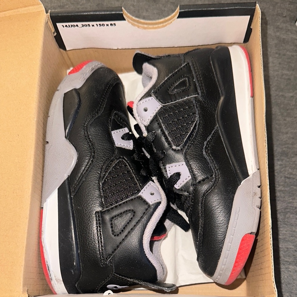 Jordan 4 Retro Black and Gold Box